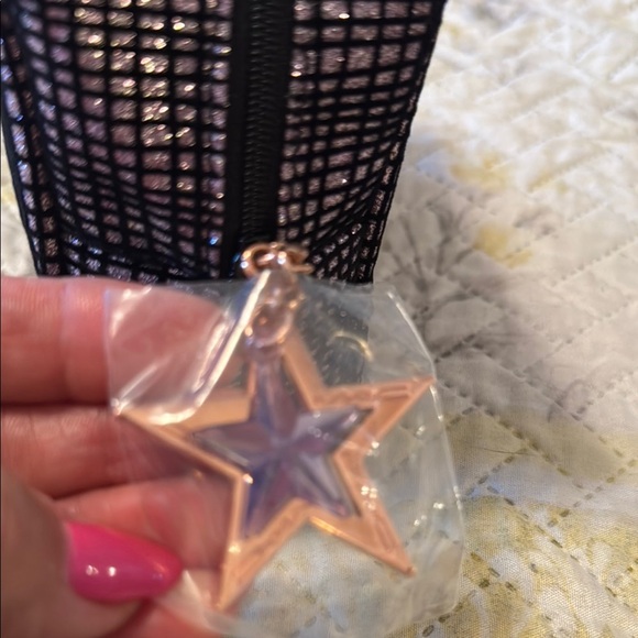 MAC Elegant Black and Gold Women's Cosmetic Bag
Soft Body - Picture 3 of 7